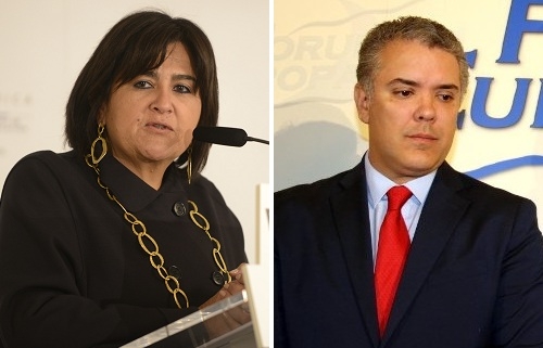 ‘Santistas’ y ‘uribistas’ discrepan en Madrid sobre el proceso de paz