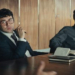 Escena de la película El Arquitecto con dos personajes en una reunión