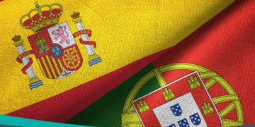 Banderas de España y Portugal entrelazadas en un diálogo intergeneracional