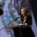 Isabel Díaz Ayuso hablando en un evento en México con bandera de México de fondo