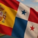 Banderas de España y Panamá ondeando juntas en un paisaje urbano
