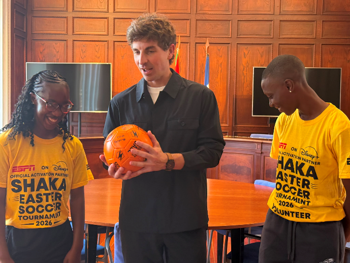 Two South African young footballers with a soccer ball in Spain