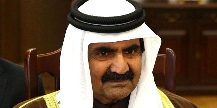 Retrato del Jeque Hamad Bin Khalifa Al Thani en una reunión oficial