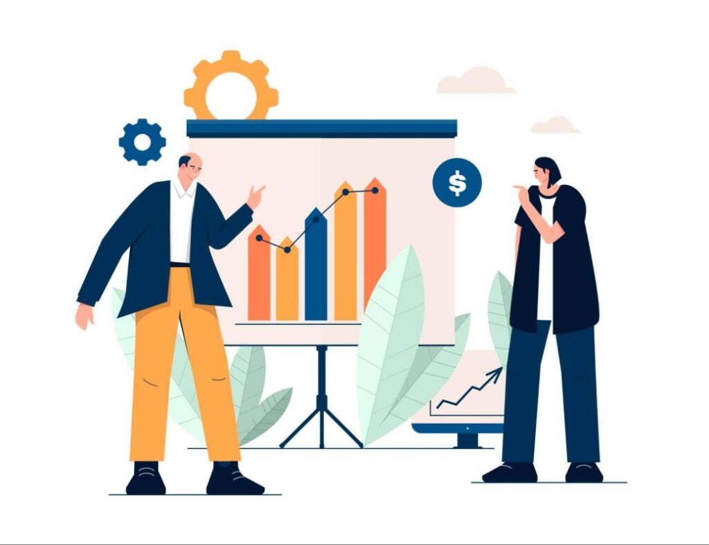 Dos personas discutiendo gráficos de inversión en un entorno de oficina